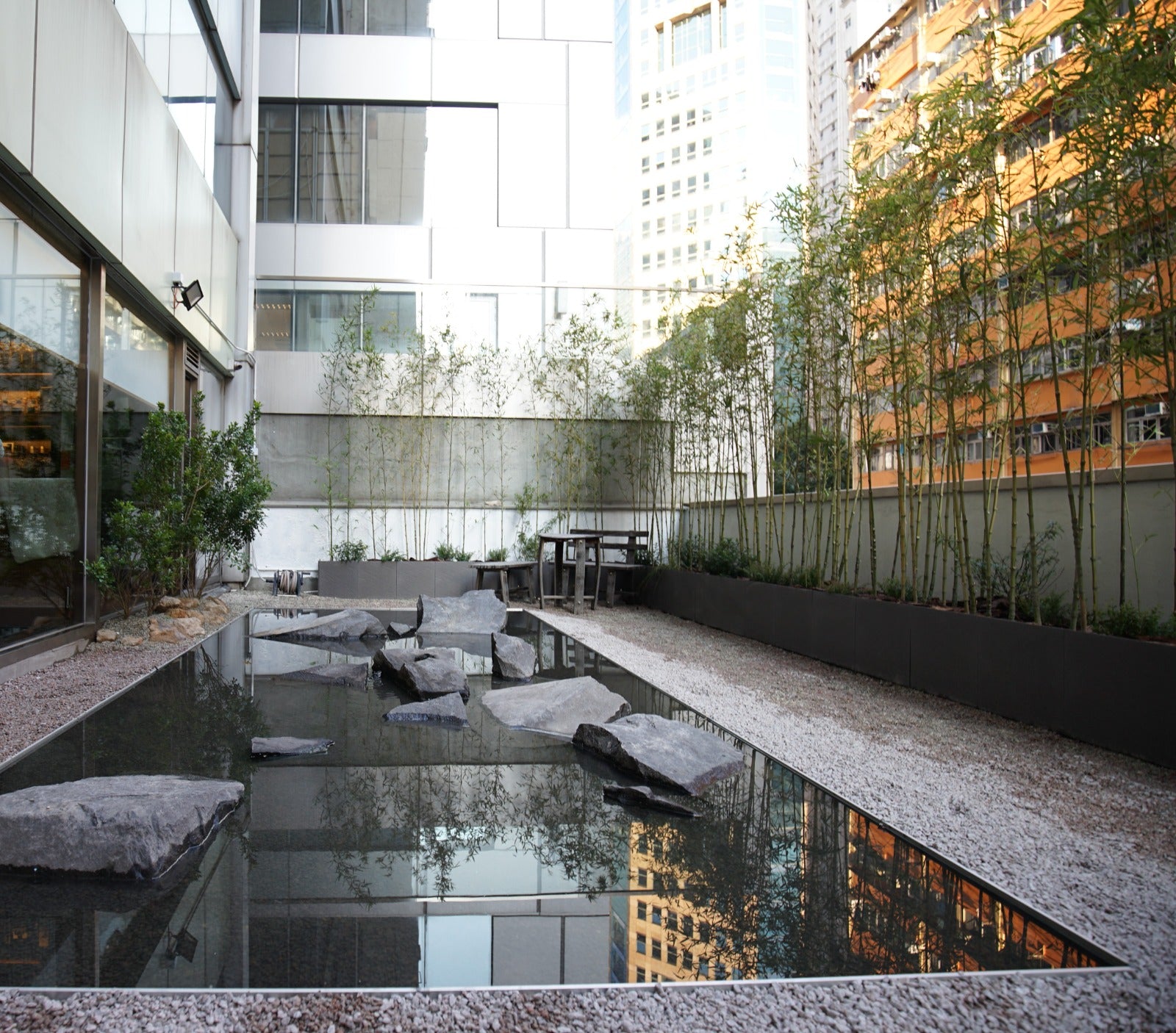 Mizunara: The Library, a classic Japanese-style bar located in a commercial building in the heart of Hong Kong Island. 
Upon stepping inside, you'll discover a tranquil ambiance with rich wooden accents, comfortable leather seating, and warm, subdued lighting. 
We also feature a peaceful terrace with a traditional Japanese garden, paying homage to Japanese craftsmanship and offering a serene space for guests to enjoy a relaxing evening.
